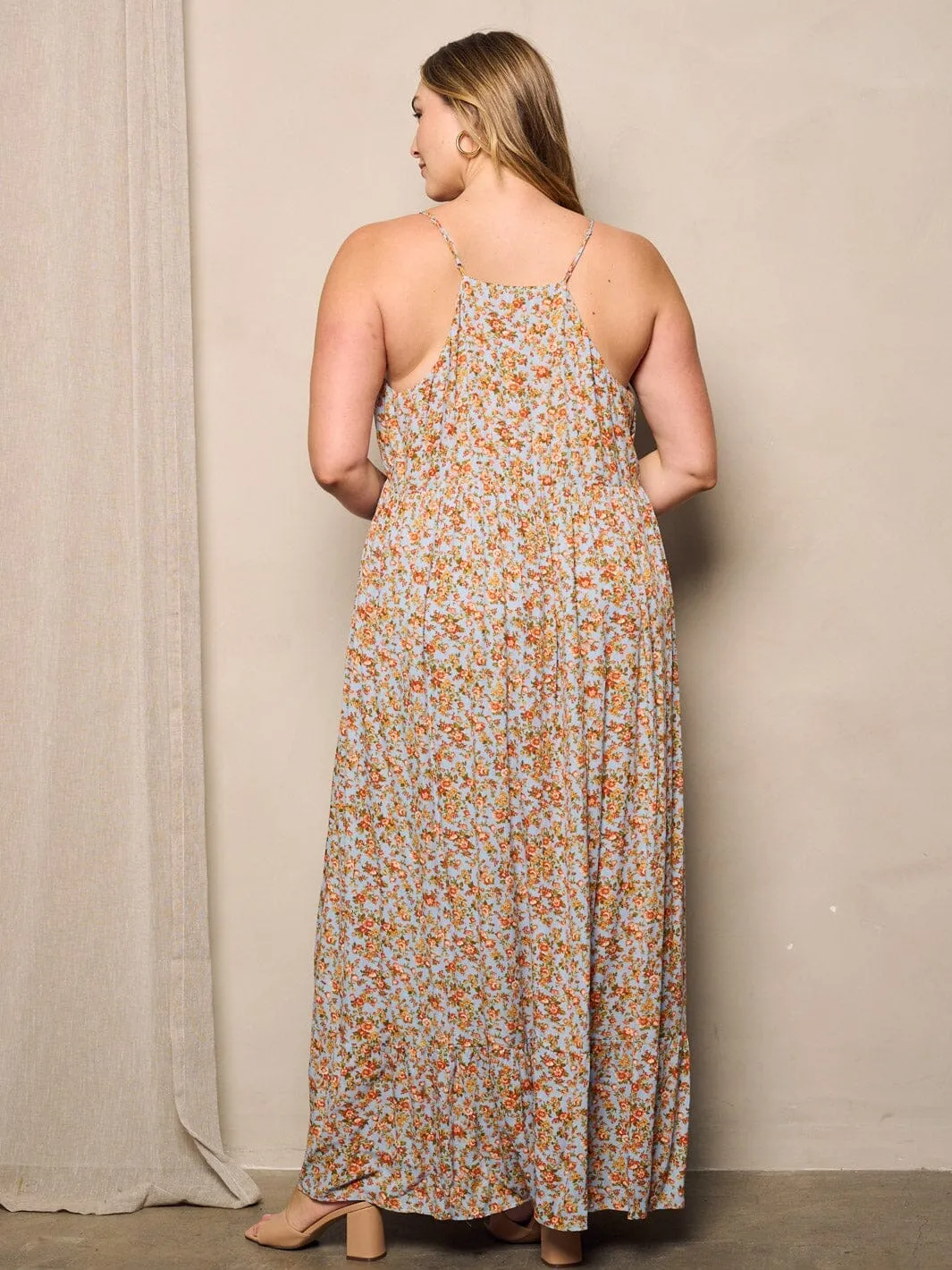 PLUS SIZE SLEEVELESS V-NECK FLORAL MAXI DRESS